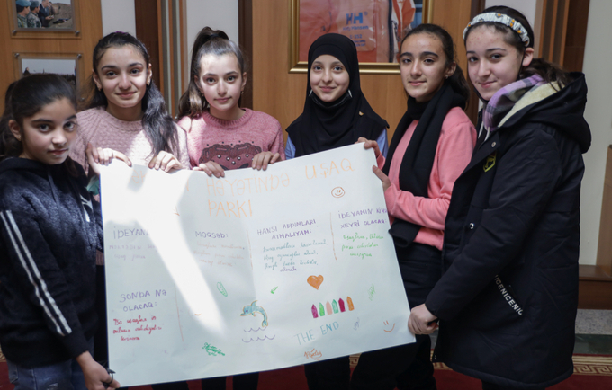  Aytan Fatullayeva (third from the left) and her teammates take part in an education project implemented within the EU4GE progra