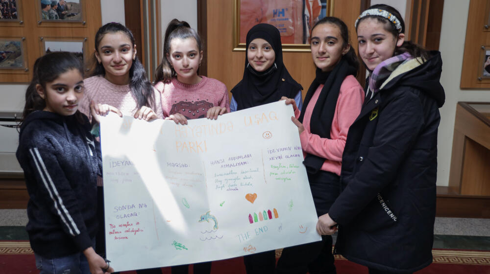  Aytan Fatullayeva (third from the left) and her teammates take part in an education project implemented within the EU4GE progra